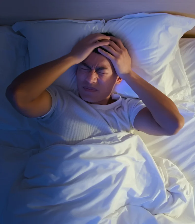 man experiencing headaches in Gilbert AZ